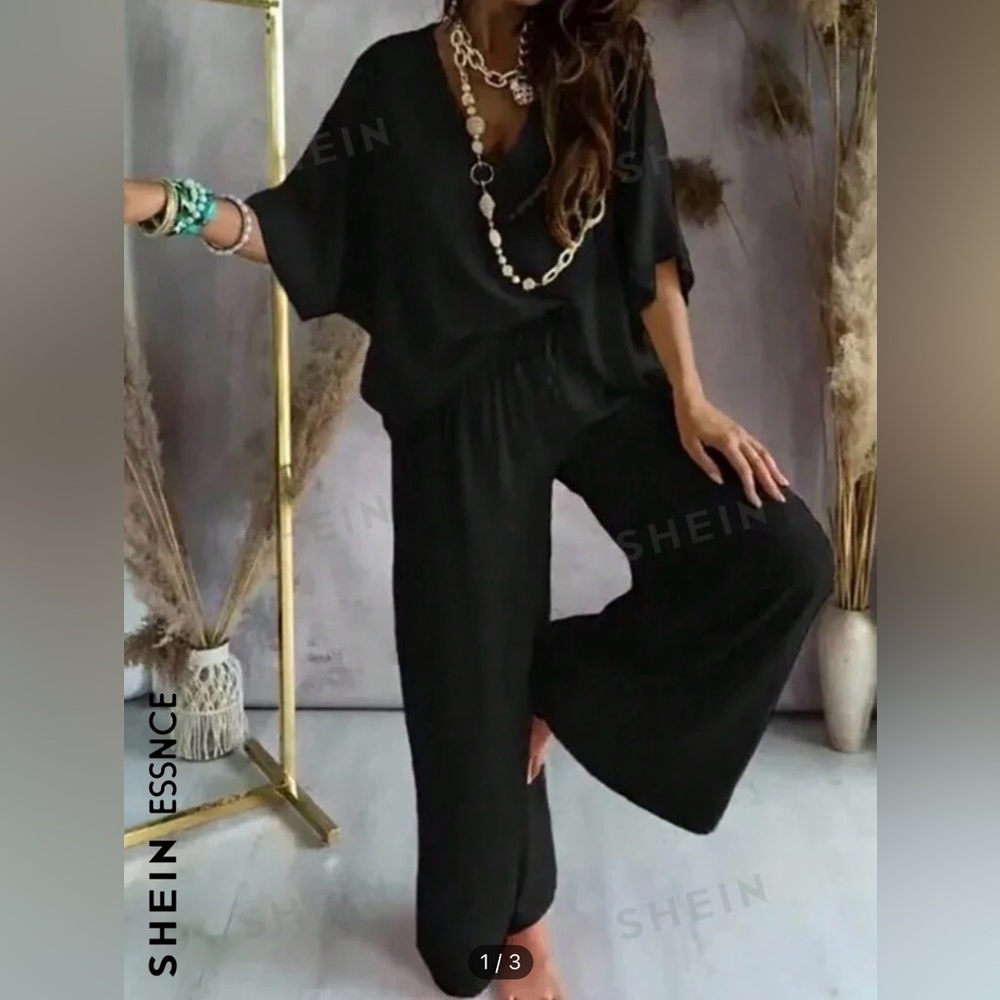 NWT 2 Piece woman’s black classic short sleeve & pant set